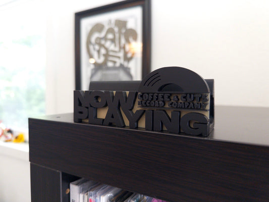 "Now Playing" - The Coffee and Cuts Record holder